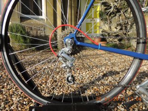 With a wide-range freewheel like this Suntour 14-30, you need to select a derailleur that can handle the largest cog. The Suntour VGT-X does this admirably.