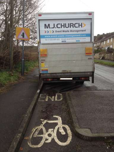 A dysfunctional cycle lane caused by an inconsiderate driver on Bathford Hill, near Bath, UK